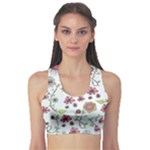 Pink whimsical flowers on blue Sports Bra