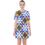 Shapes on a blue background                                                              Sixties Short Sleeve Mini Dress