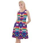 Pastel shapes rows on a purple background                                                                      Knee Length Skater Dress With Pockets
