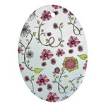 Pink whimsical flowers on blue Oval Ornament (Two Sides)